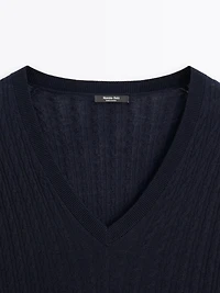 V-neck cable-knit sweater