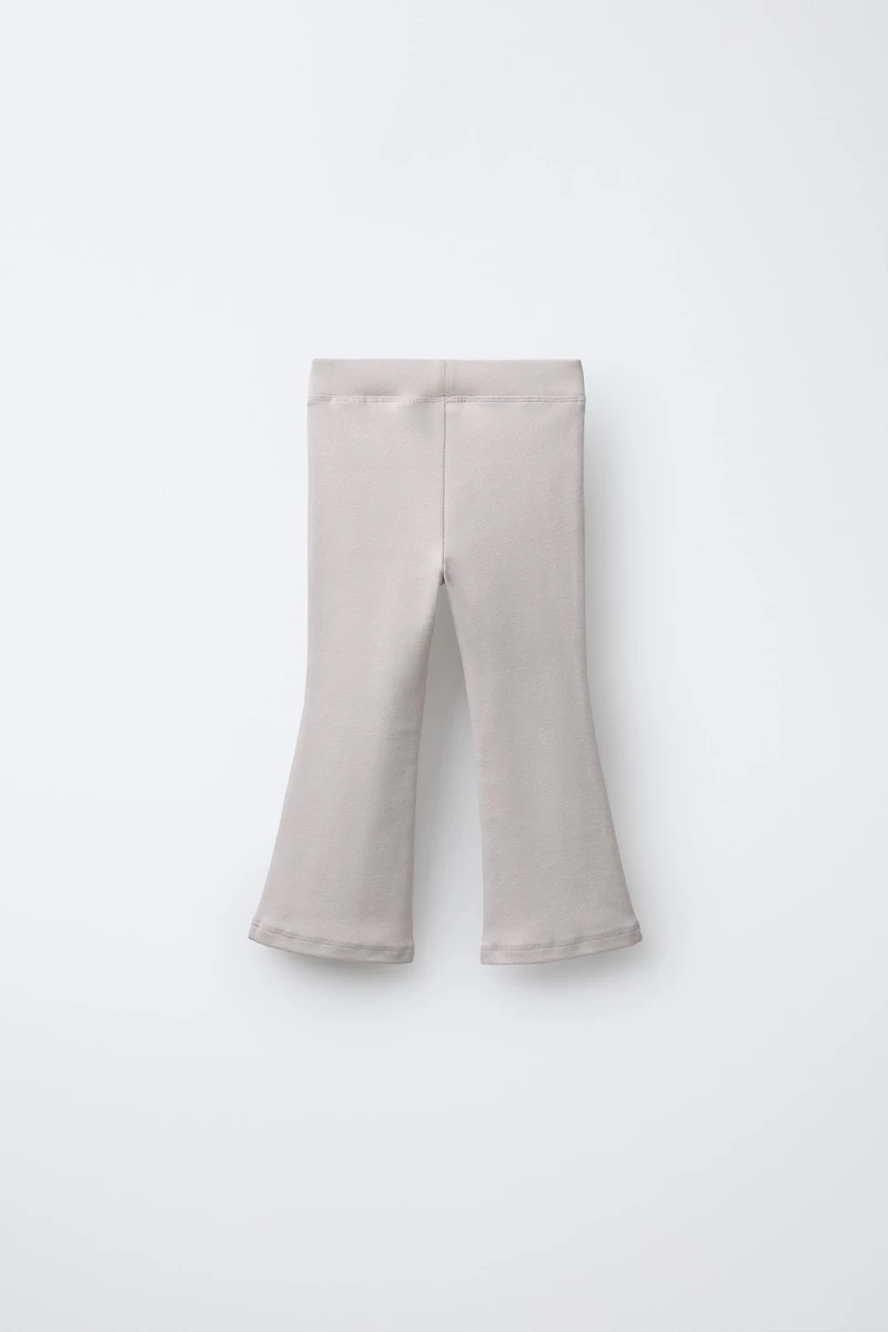 PLUSH FLARE PANTS WITH RAISED TEXT
