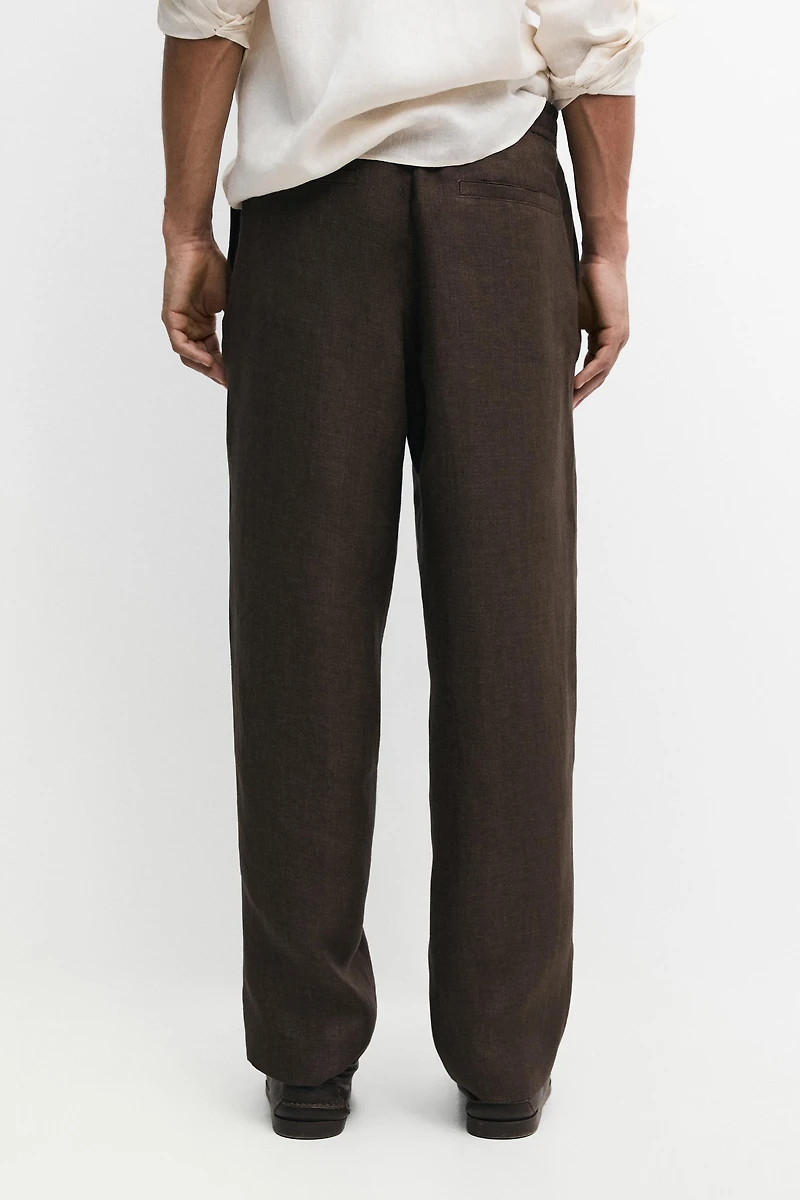 Faded total look linen trousers
