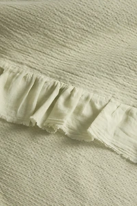 TEXTURED BEDSPREAD WITH RUFFLE TRIM