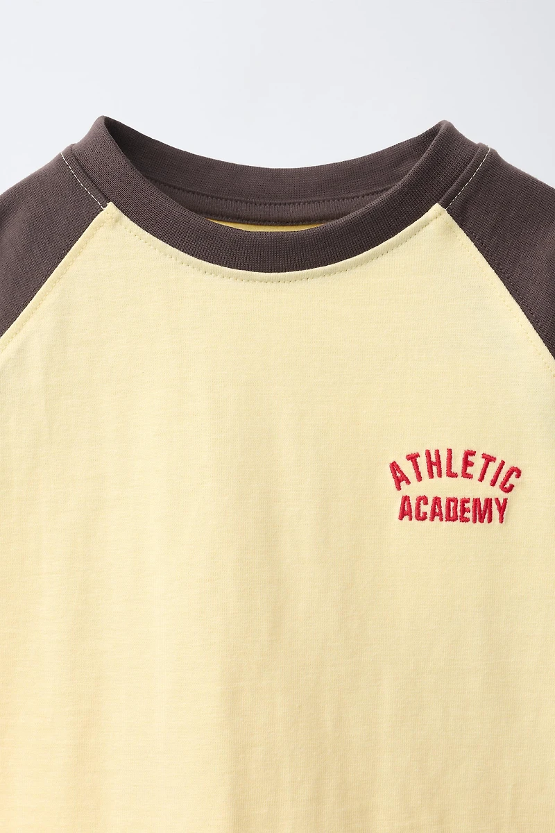 EMBROIDERED RAGLAN SLEEVE T-SHIRT