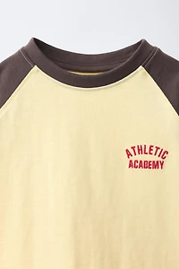 EMBROIDERED RAGLAN SLEEVE T-SHIRT