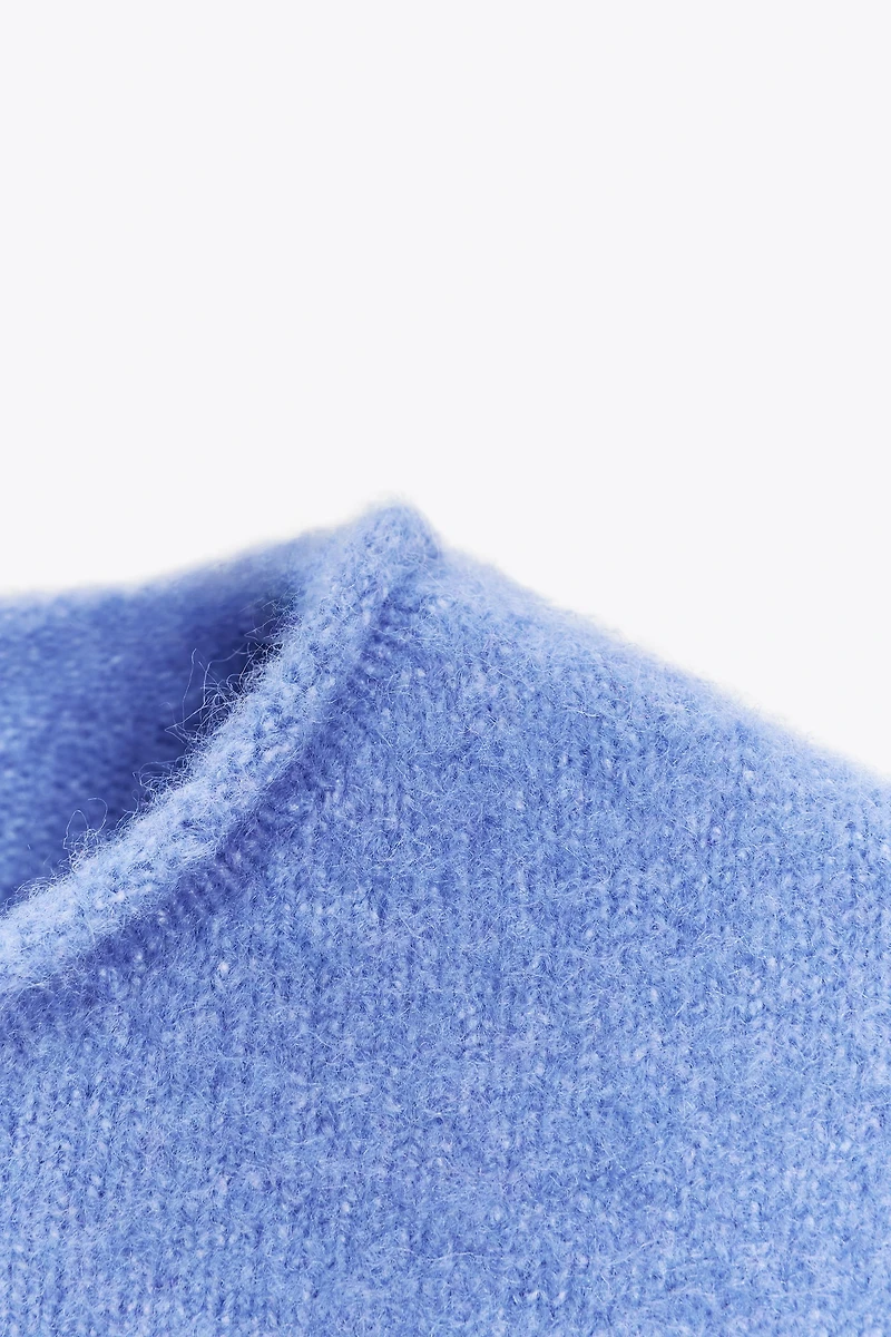 SHORT SLEEVE KNIT SWEATER