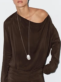 Long flowing dress with draped sash belt