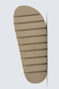 VOLUMINOUS LEATHER SANDALS