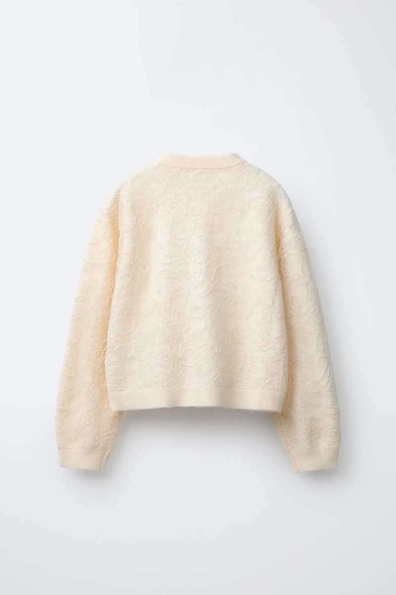 GILET EN MAILLE TULLE ET PAILLETTES