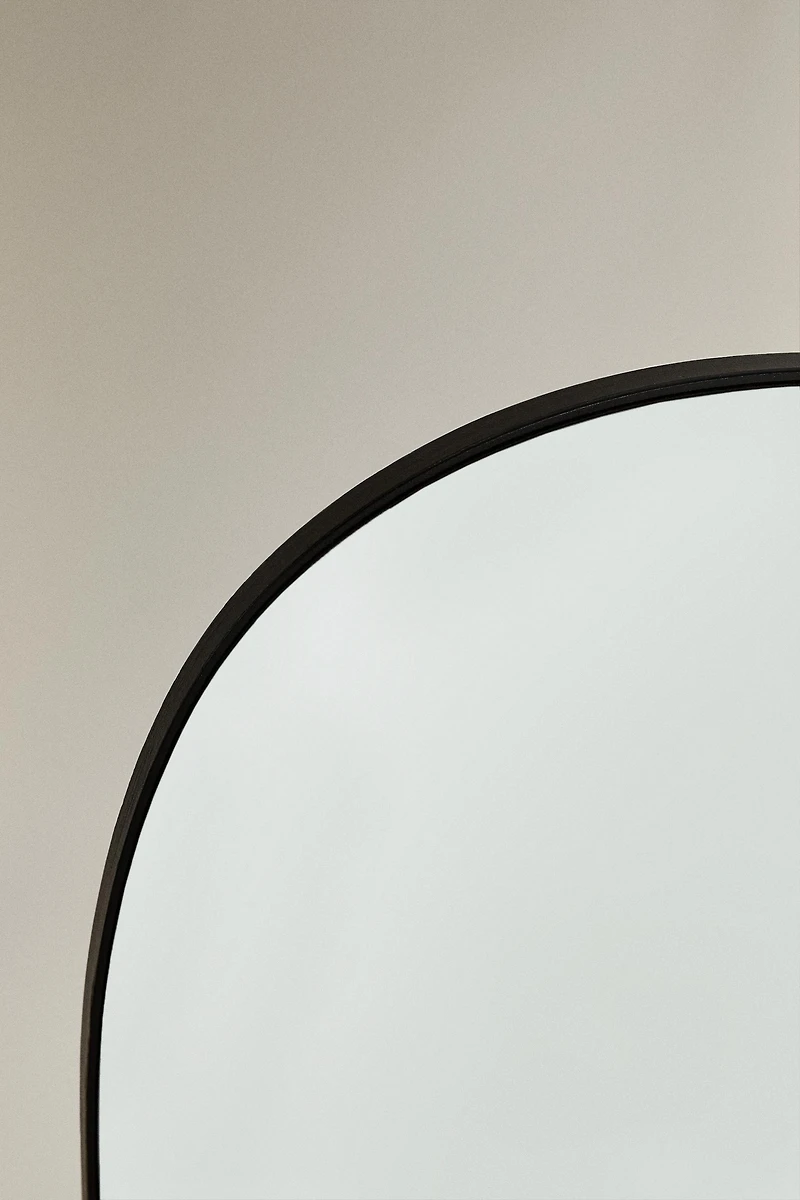 SMALL IRREGULAR WALL MIRROR