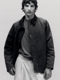 Jacket with leather collar detail