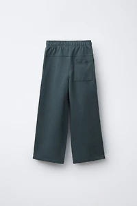 PANTALON EN MOLLETON AVEC ÉTIQUETTE