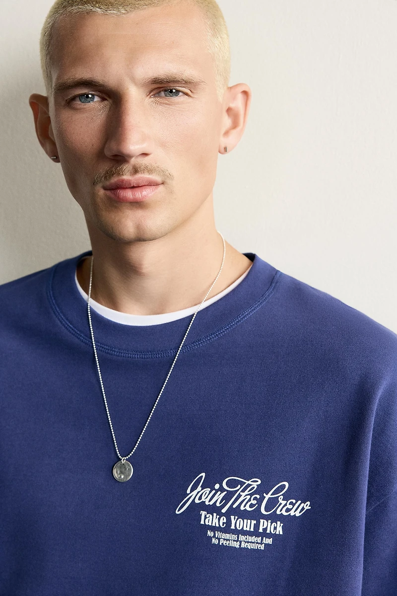 RELAXED FIT CONTRAST GRAPHIC SWEATSHIRT