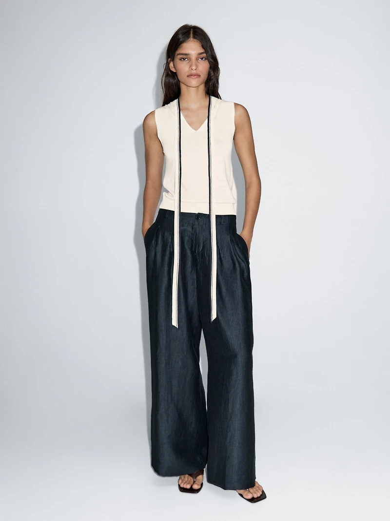 Knit vest with tie detail