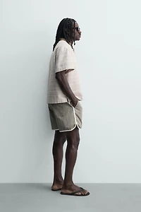 RELAXED FIT STRIPED POLO SHIRT