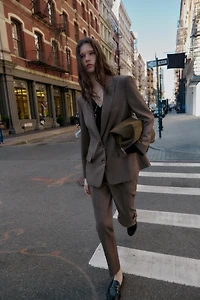 PANTS WITH BUTTONED HEM