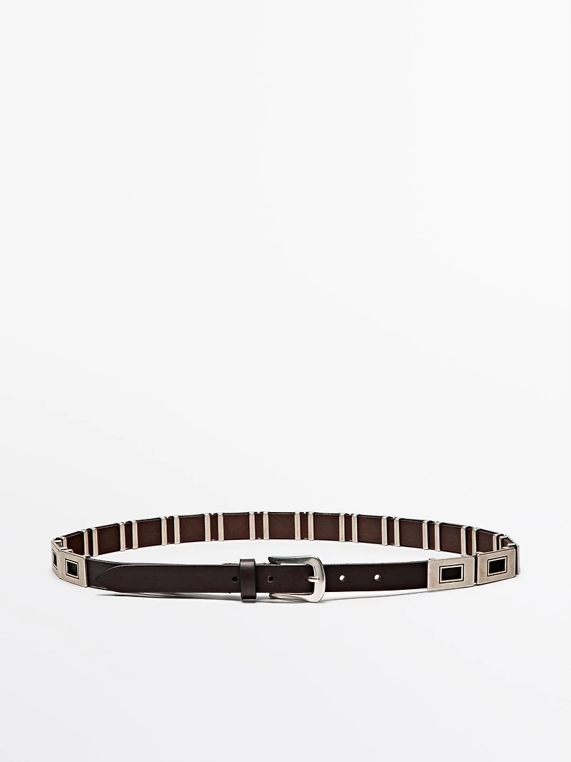 Belt with metal appliqués