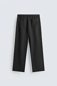 FLOWY PLEATED PANTS