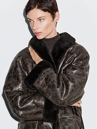 Mouton leather coat with crackled finish