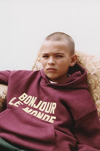 FLOCKED TEXT SWEATSHIRT