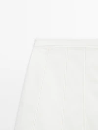 Short denim skirt with seam details