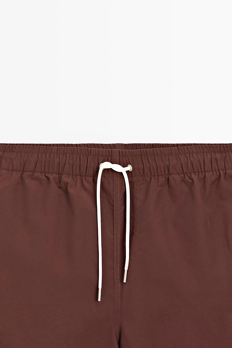 Solid Swim Trunks