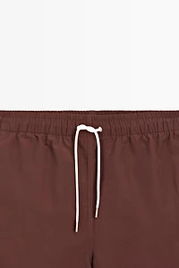 Solid Swim Trunks