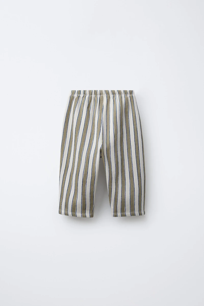 PANTALON BAGGY À RAYURES ET DÉCOR ÉTIQUETTE