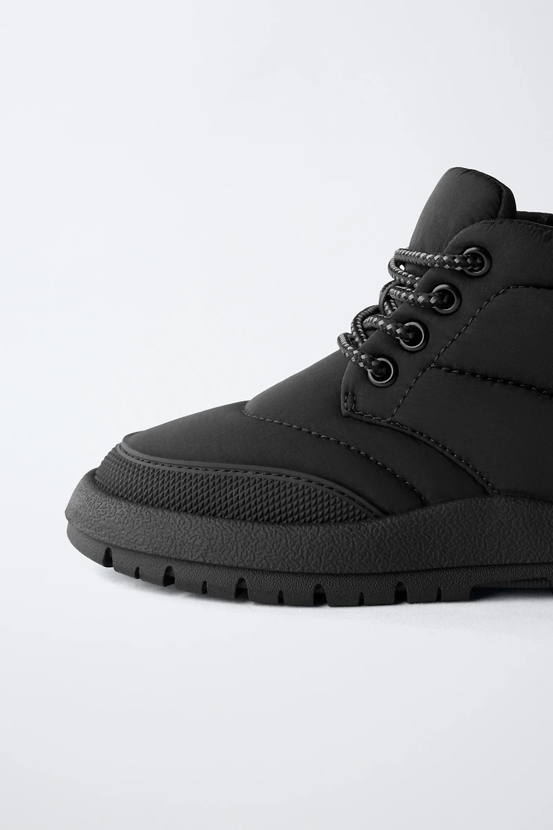 BOTTES EN NYLON DÉPERLANTES