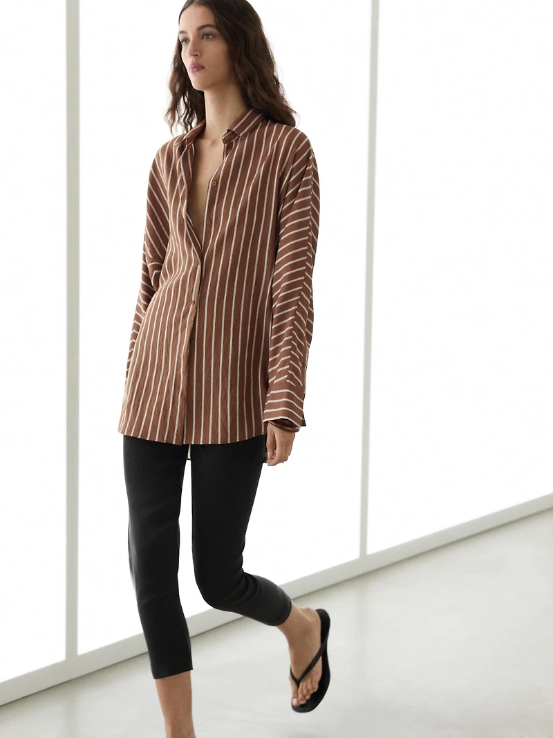 Flowing striped shirt with batwing sleeves