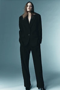 LIMITED EDITION WOOL PLEATED PANTS