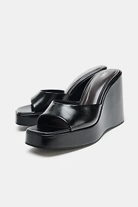WEDGE HEELED SANDALS