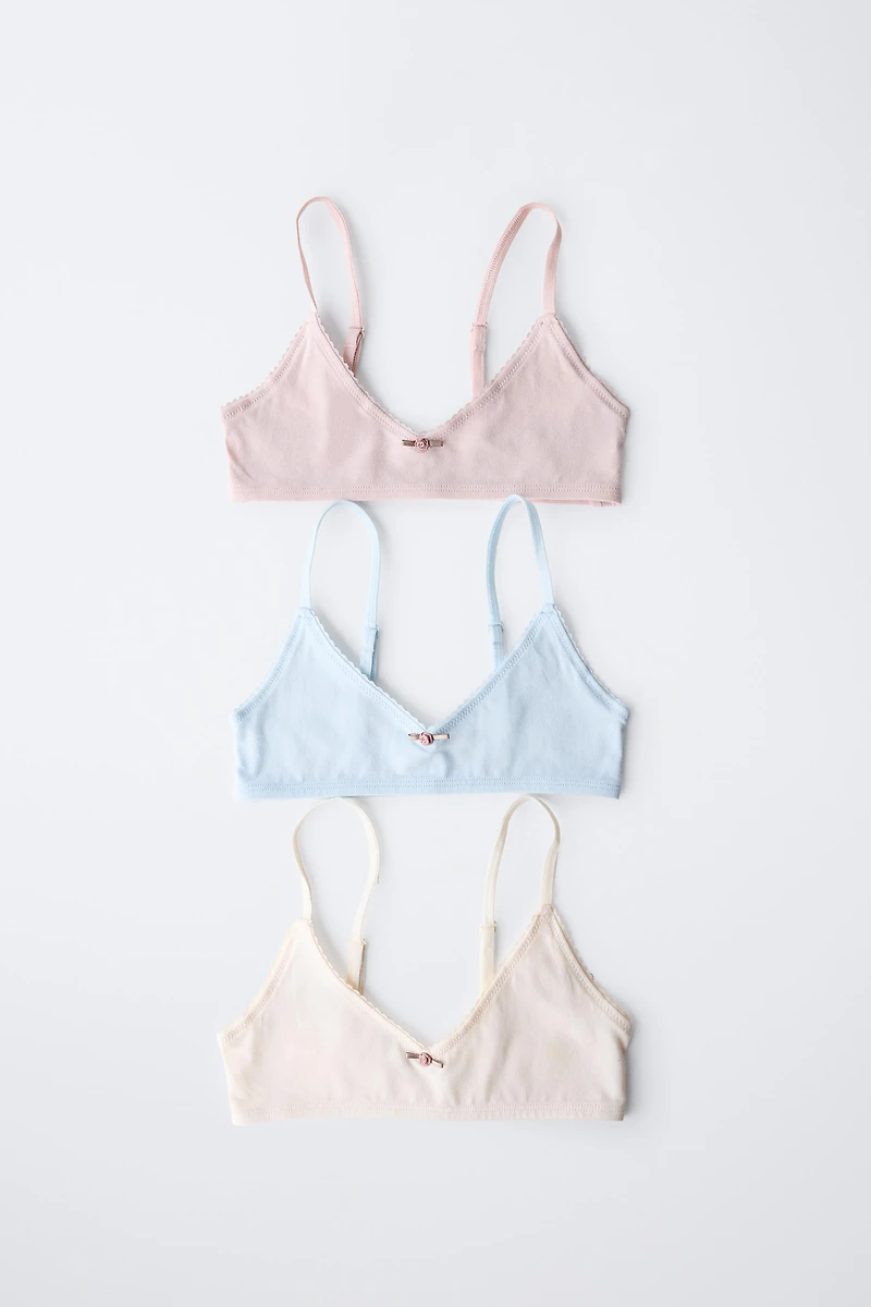 9-14 ANS/ LOT DE TROIS TOPS FLEUR