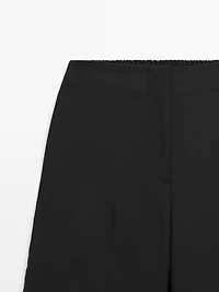 100% wool cropped wide-leg elasticated trousers