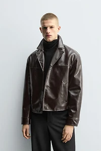 BLOUSON EN MATIÈRE SYNTHÉTIQUE