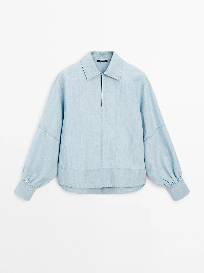 Oversize denim blouse with puff sleeves
