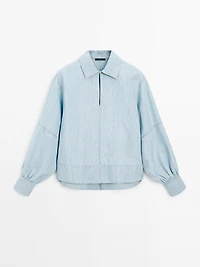 Oversize denim blouse with puff sleeves