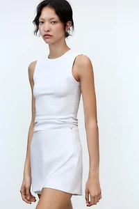 JUPE-CULOTTE ASYMÉTRIQUE