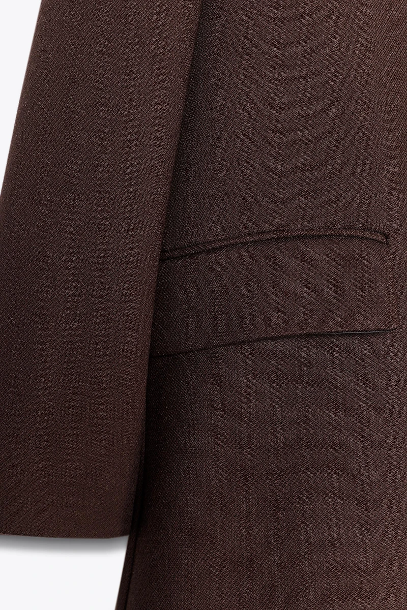 SHOULDER PAD SLEEVELESS COAT
