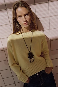 ASYMMETRIC HEM KNIT SWEATER