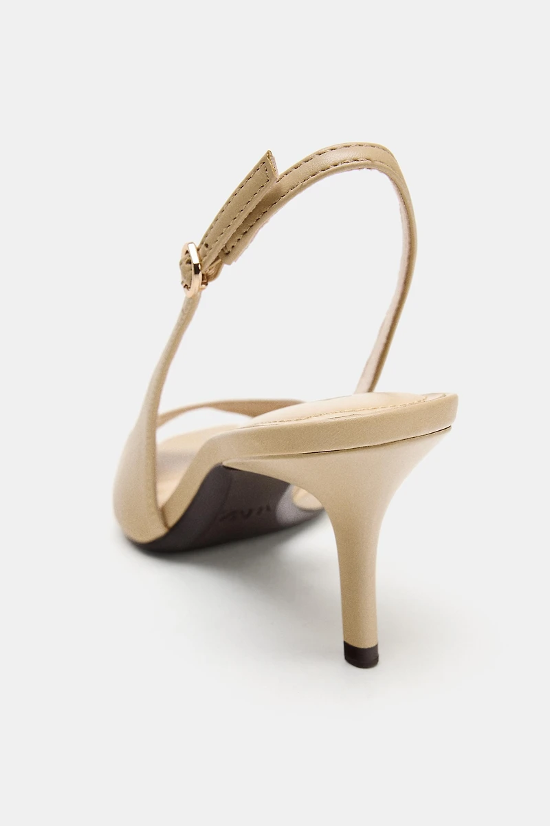 ASYMMETRIC HEELED SANDALS