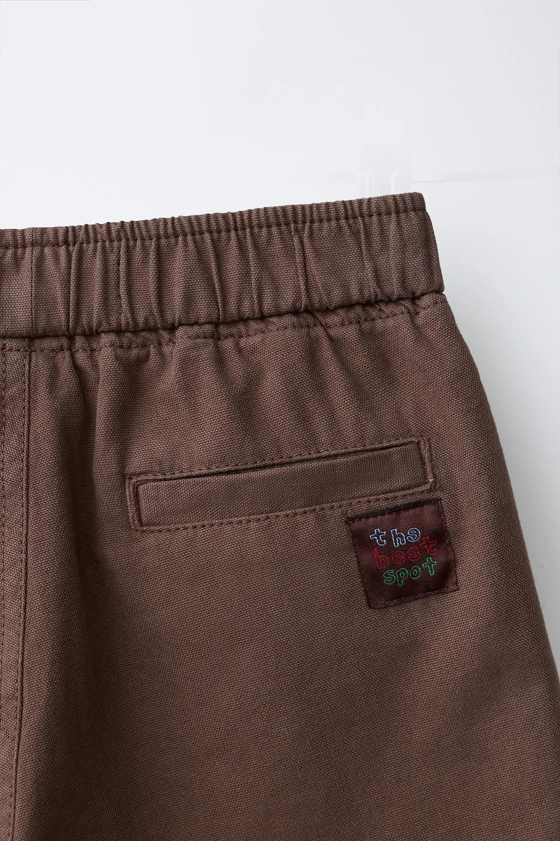 SHORT EN TOILE