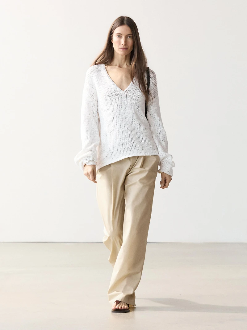 Pull maille ajourée col en V