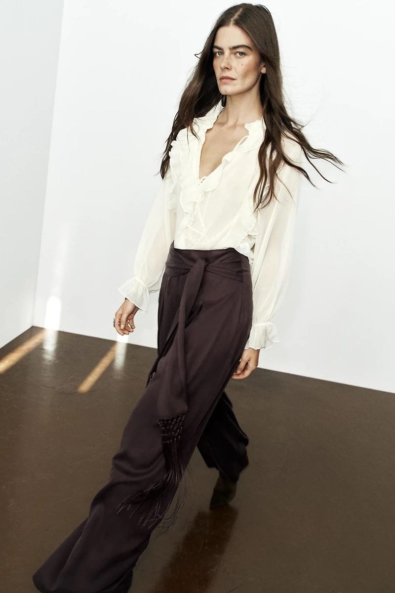 FRINGE BELT TROUSERS