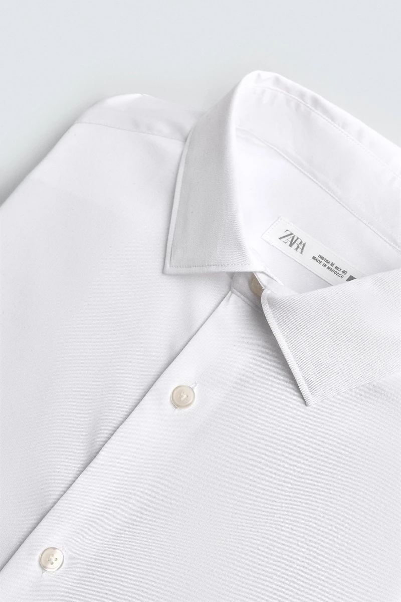 CHEMISE SLIM FIT BOUTONS DE MANCHETTE