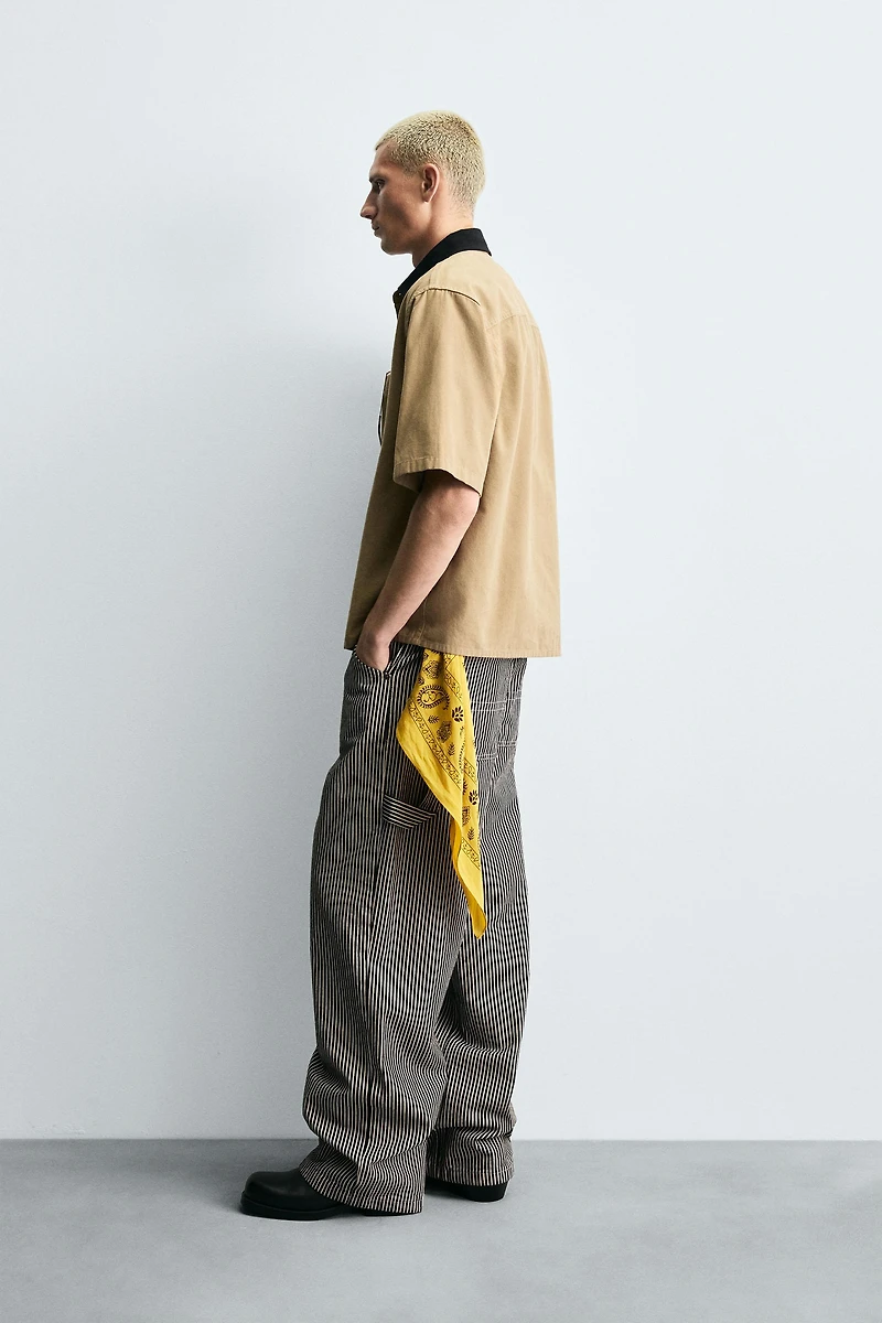 STRIPED BAGGY FIT CARPENTER PANTS