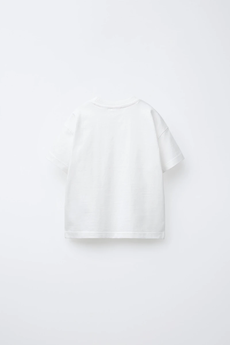 T-SHIRT UNI À POCHE