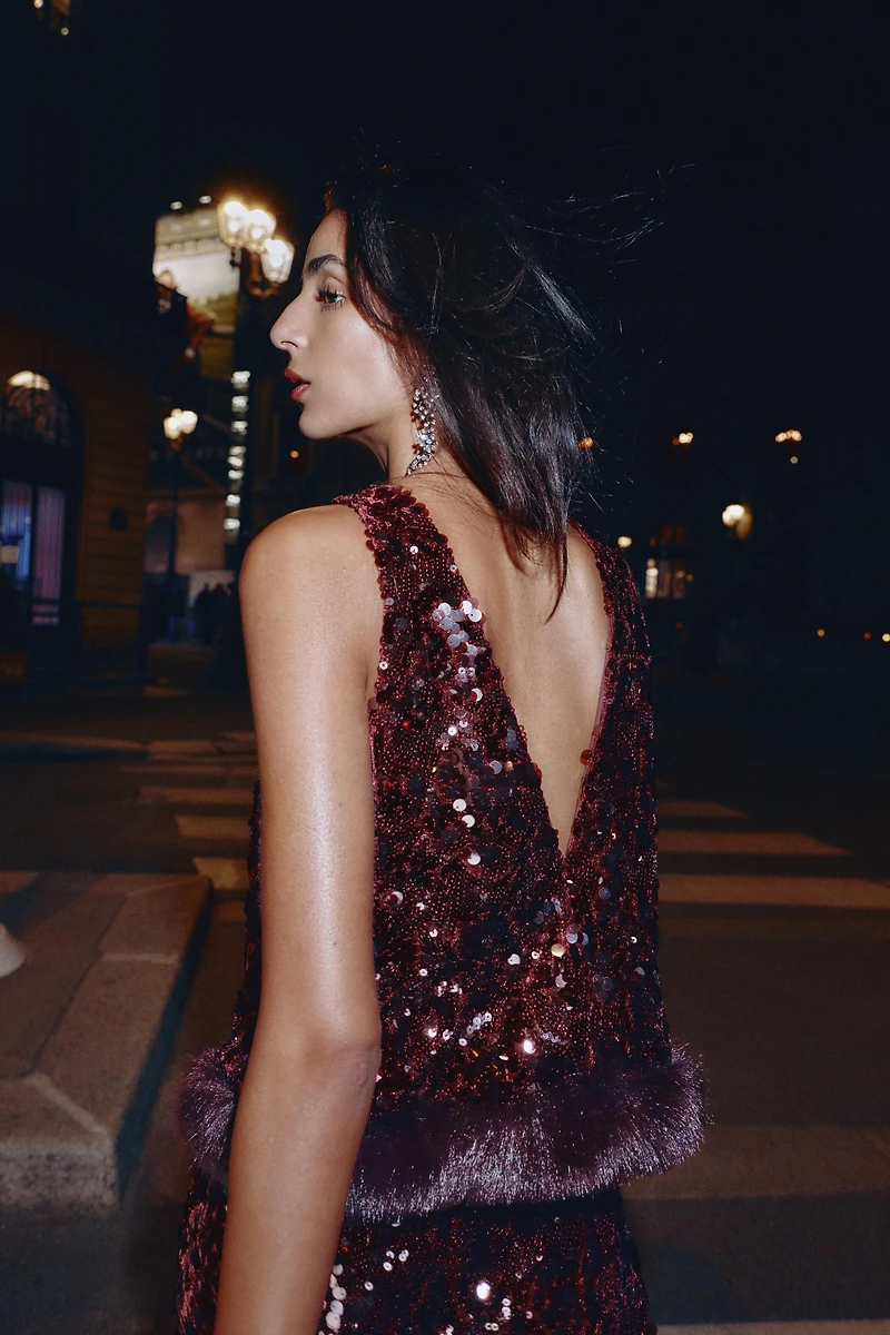 SEQUIN TOP WITH FAUX FUR HEM