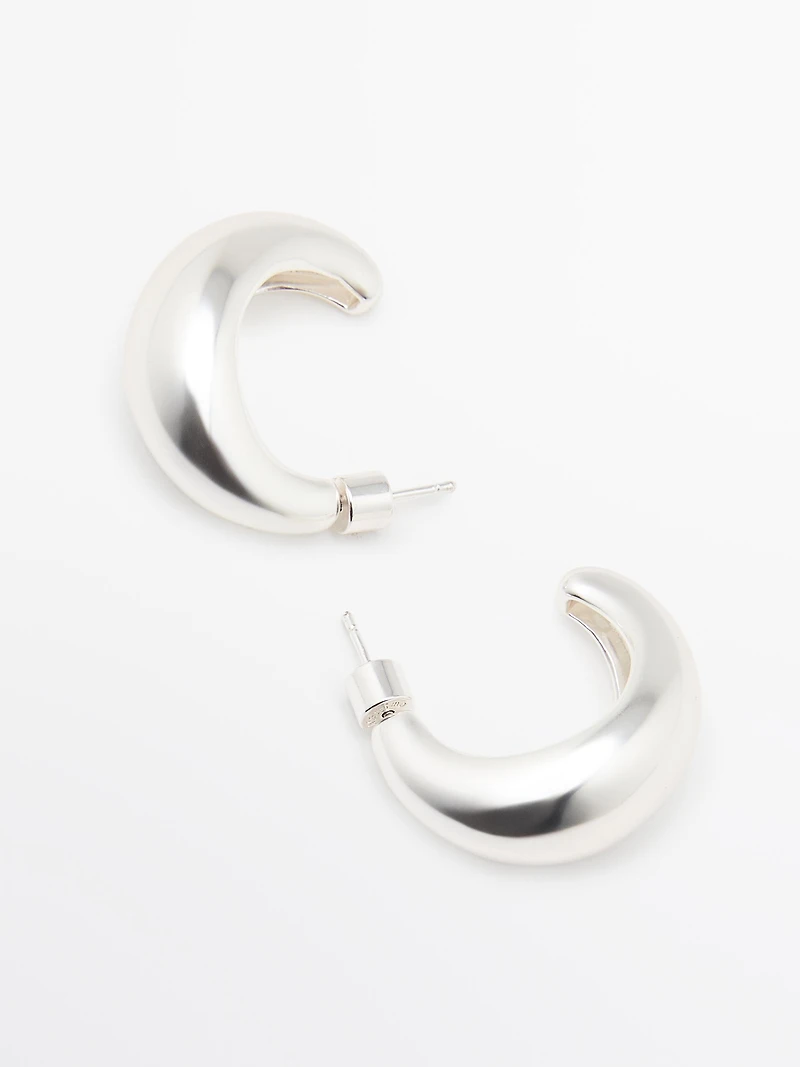 Half-moon hoop earrings