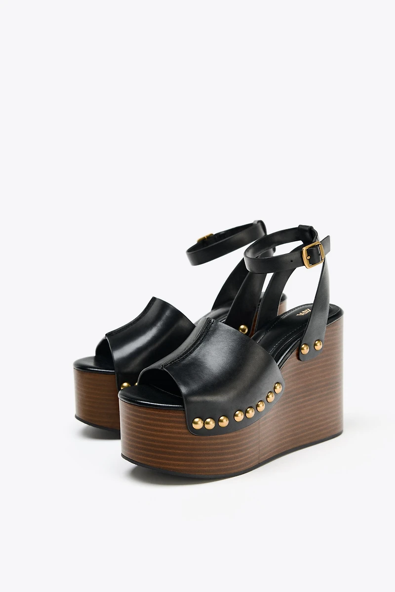 STUDDED LEATHER WEDGE SANDALS