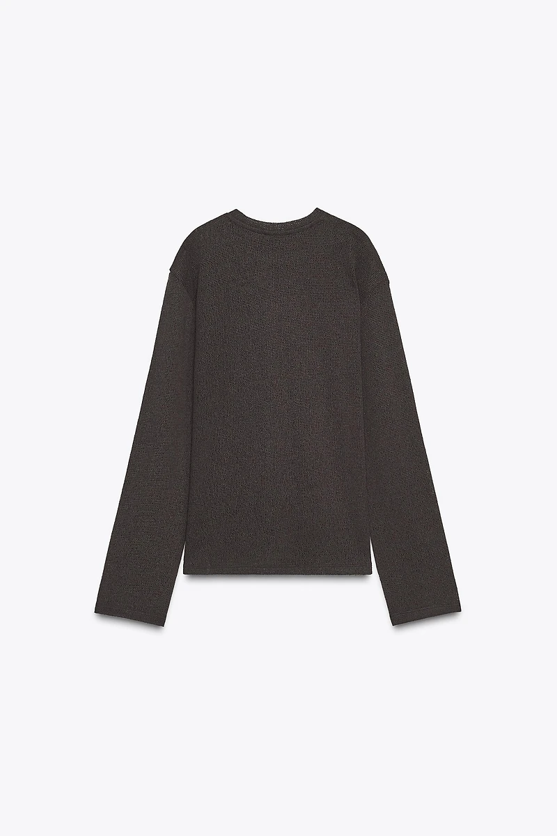TOP EN MAILLE AJOURÉ