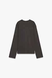 TOP EN MAILLE AJOURÉ