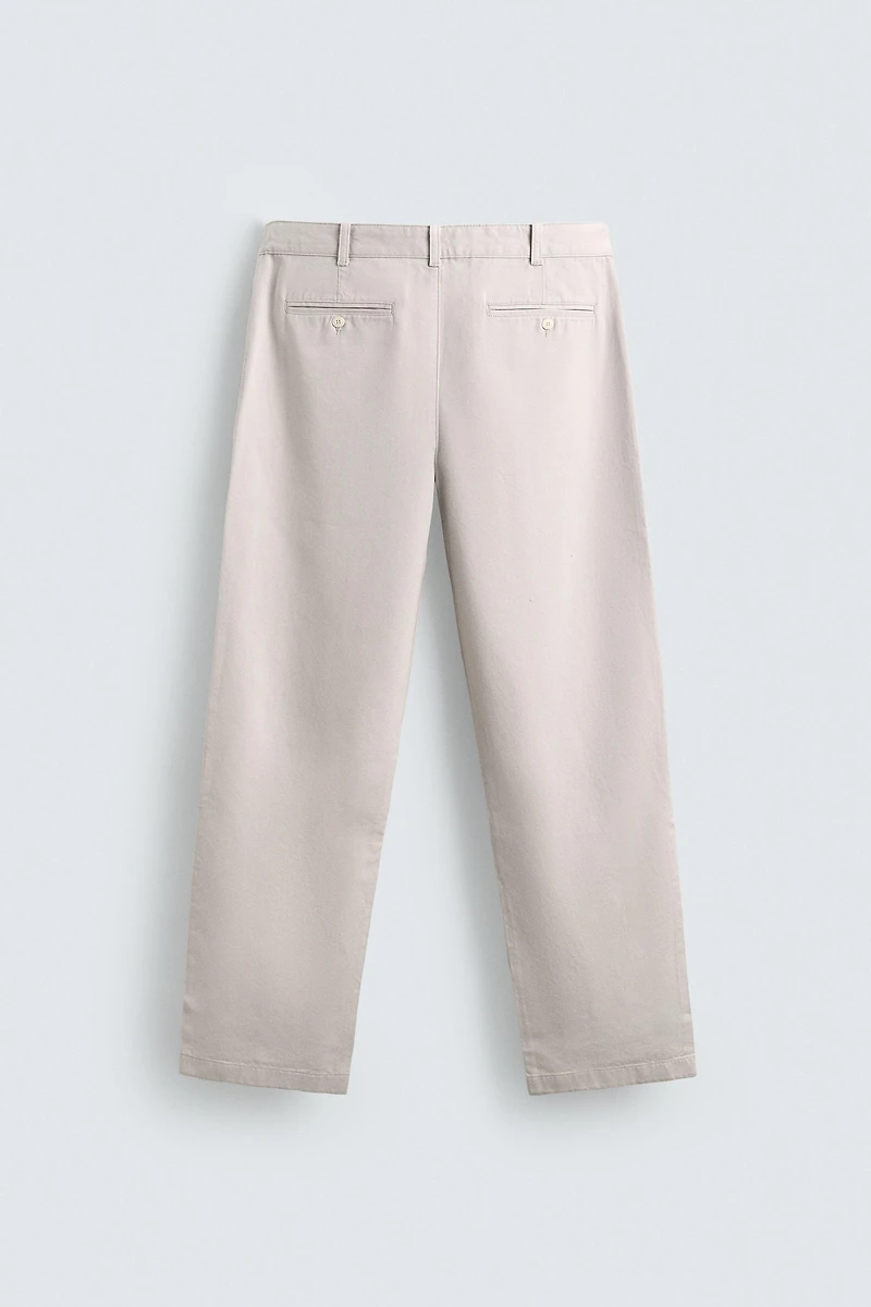 RELAXED FIT PLEATED PANTS